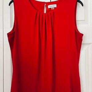 Calvin Klein red blouse.